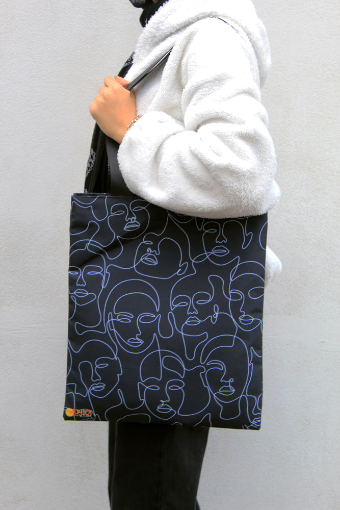 Abstract Faces Tote Bag
