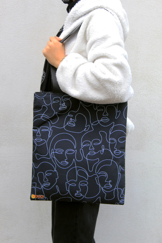 Abstract Faces Tote Bag