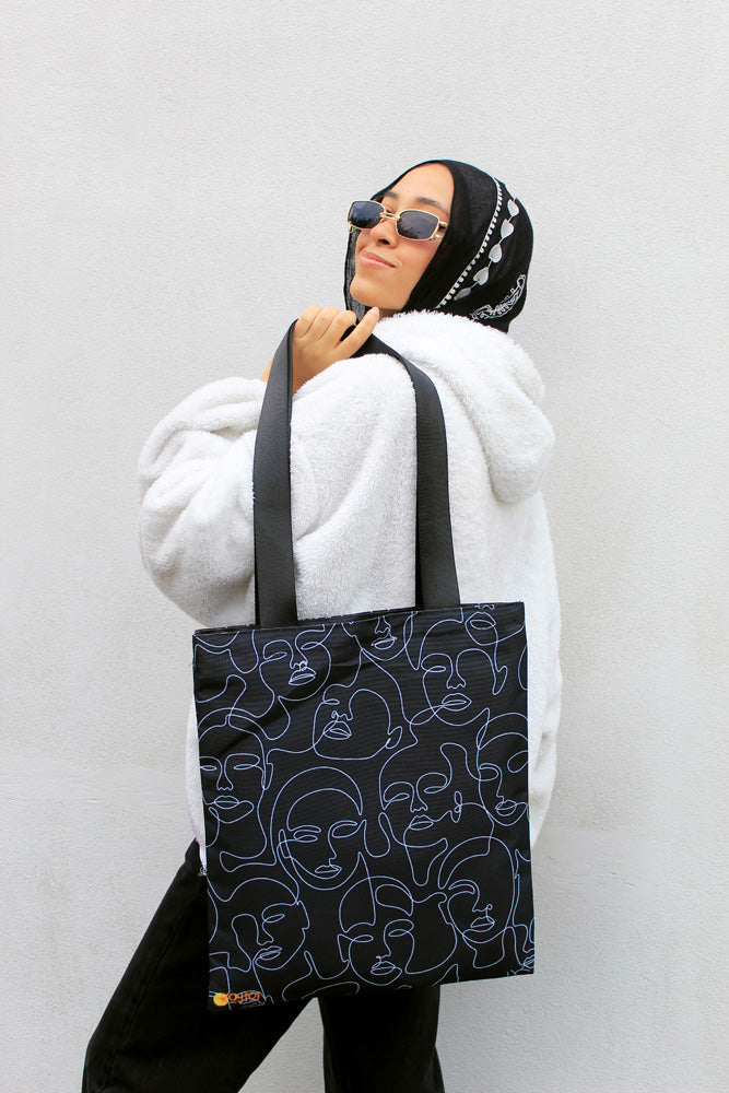 Abstract Faces Tote Bag